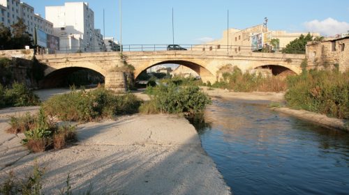 ponte sul fiume oreto